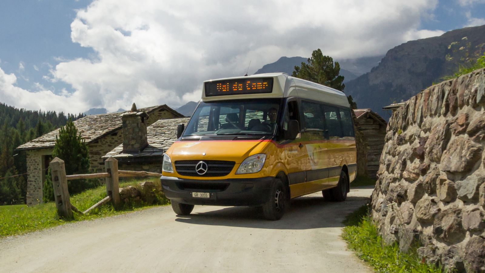 The flexible PubliCar dial-a-ride bus is on the road in Val Poschiavo, bringing passengers to their destination.