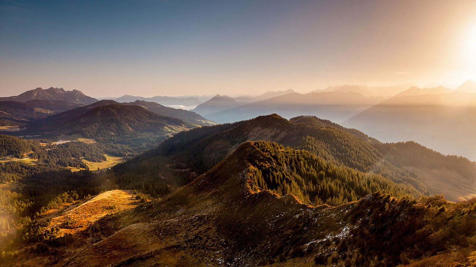 View from the Fürstein over the Alps towards Lake Sarnen in autumnal morning light. @ UNESCO Entlebuch Biosphere Reserve